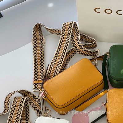Кожаная сумка coccinelle Jen mini 19•12•6 cm   цвет желтый с текстильным плечевым ремнем