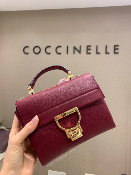 Кожаная сумка Coccinelle arlettis mini цвет бордовый